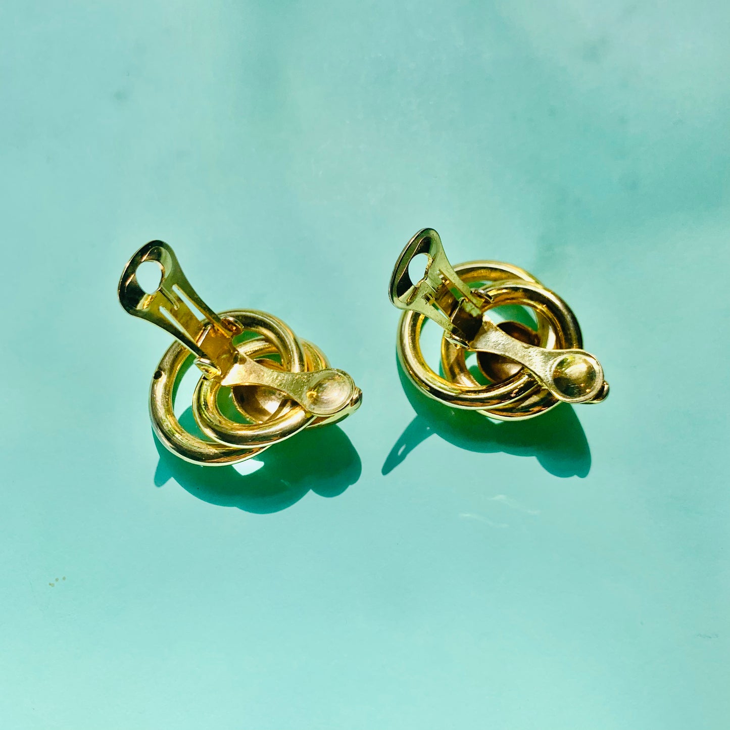 Rare 1980s triple gold plated double hoops drop clip on earrings by Monet
