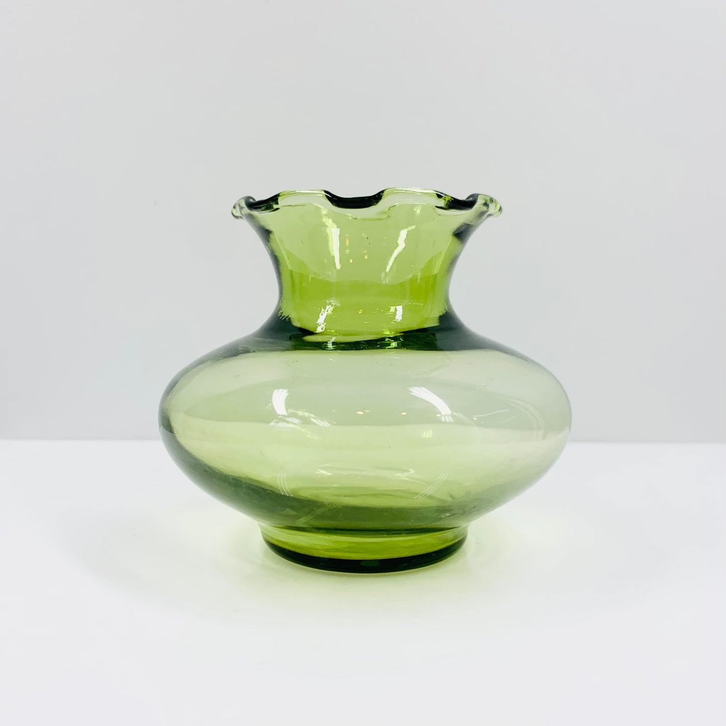 Antique glass posy vase with ruffle rim