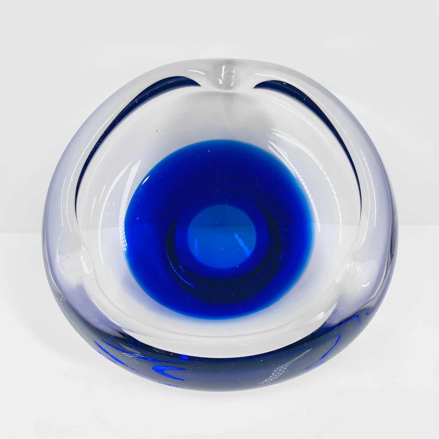 MCM Dutch Maastricht clear glass ashtray with blue sommerso base