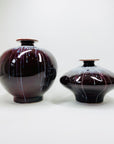 Vintage Chinese maroon bleed flambé pottery squat vase