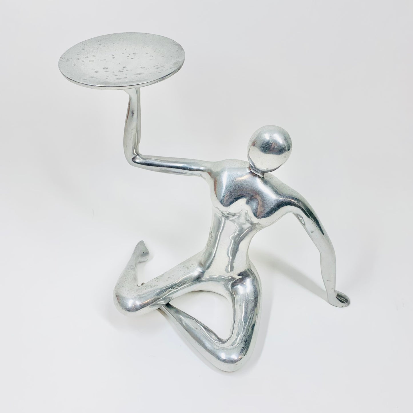 Rare 1980s post-modern chrome steel seated nude sculpture/candle holder