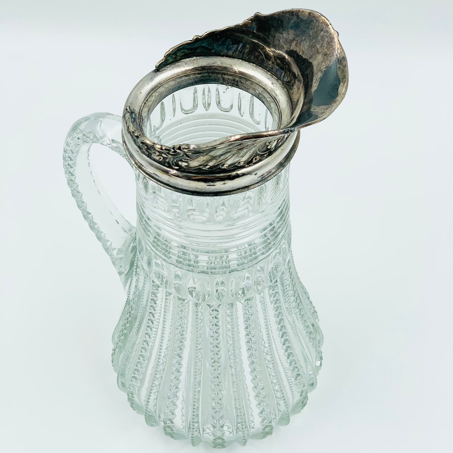 Antique pressed glass jug