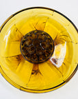 Antique Art Deco amber glass float bowl with matching flower frog