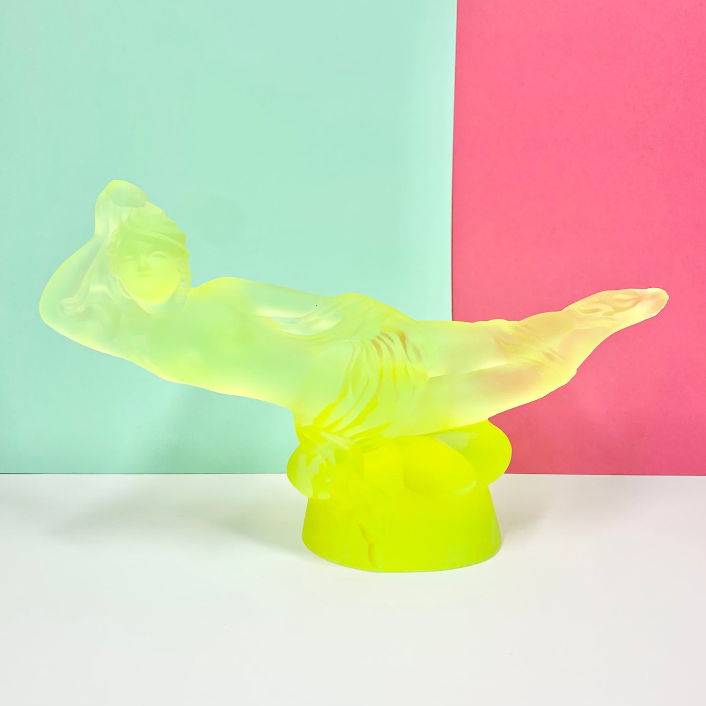 Art Deco reproduction of Lalique lie down Nude with star bangle cape figurine in uranium glass