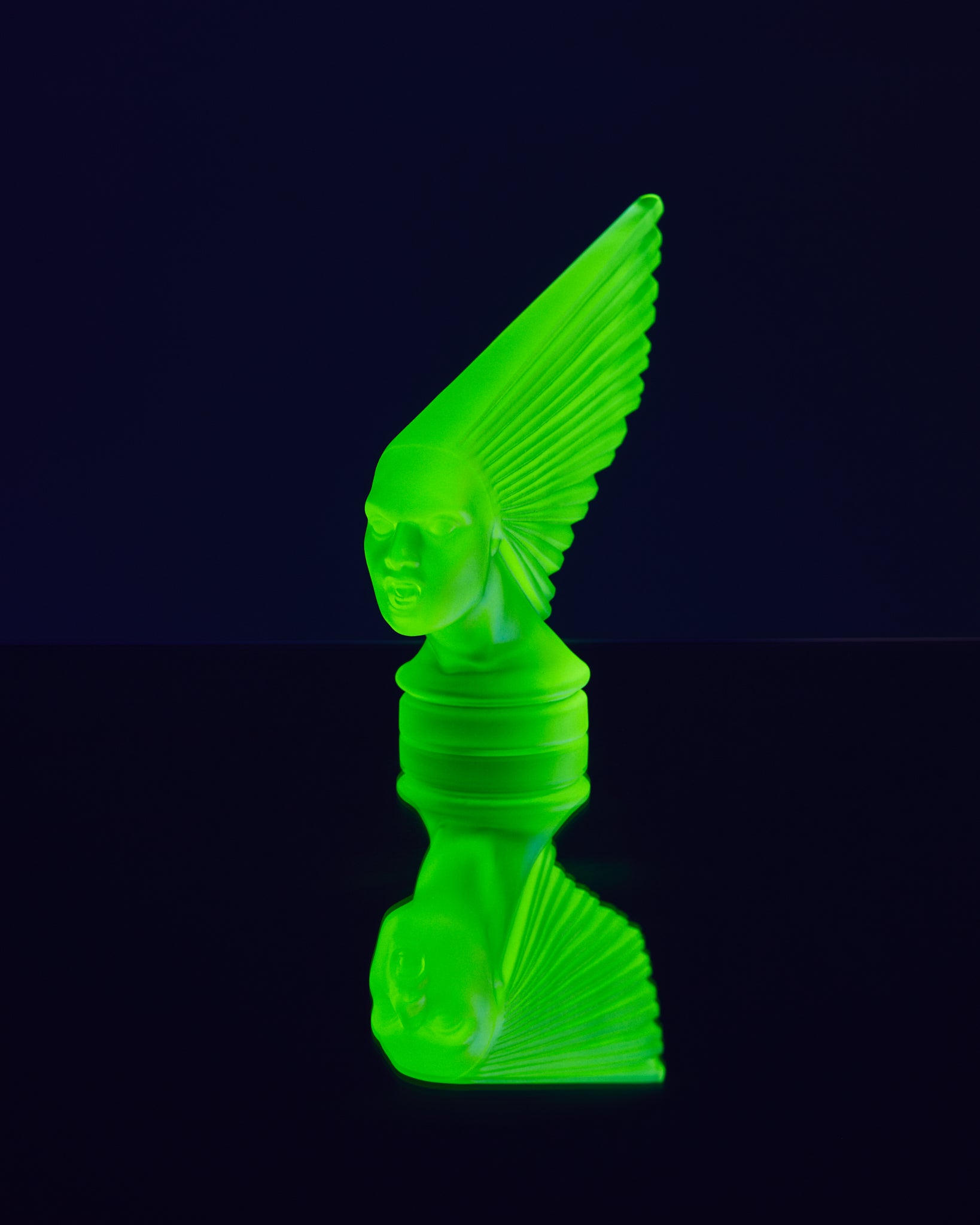 Art Deco reproduction of Lalique car mascot Victoire in uranium glass