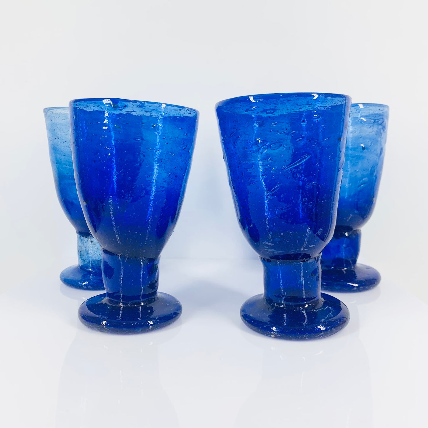 MCM mouth blown cobalt footed glass